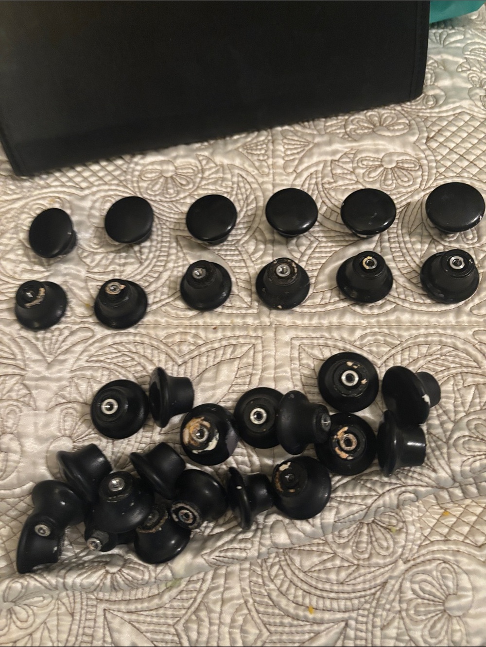 30 black cabinet or drawer knobs.